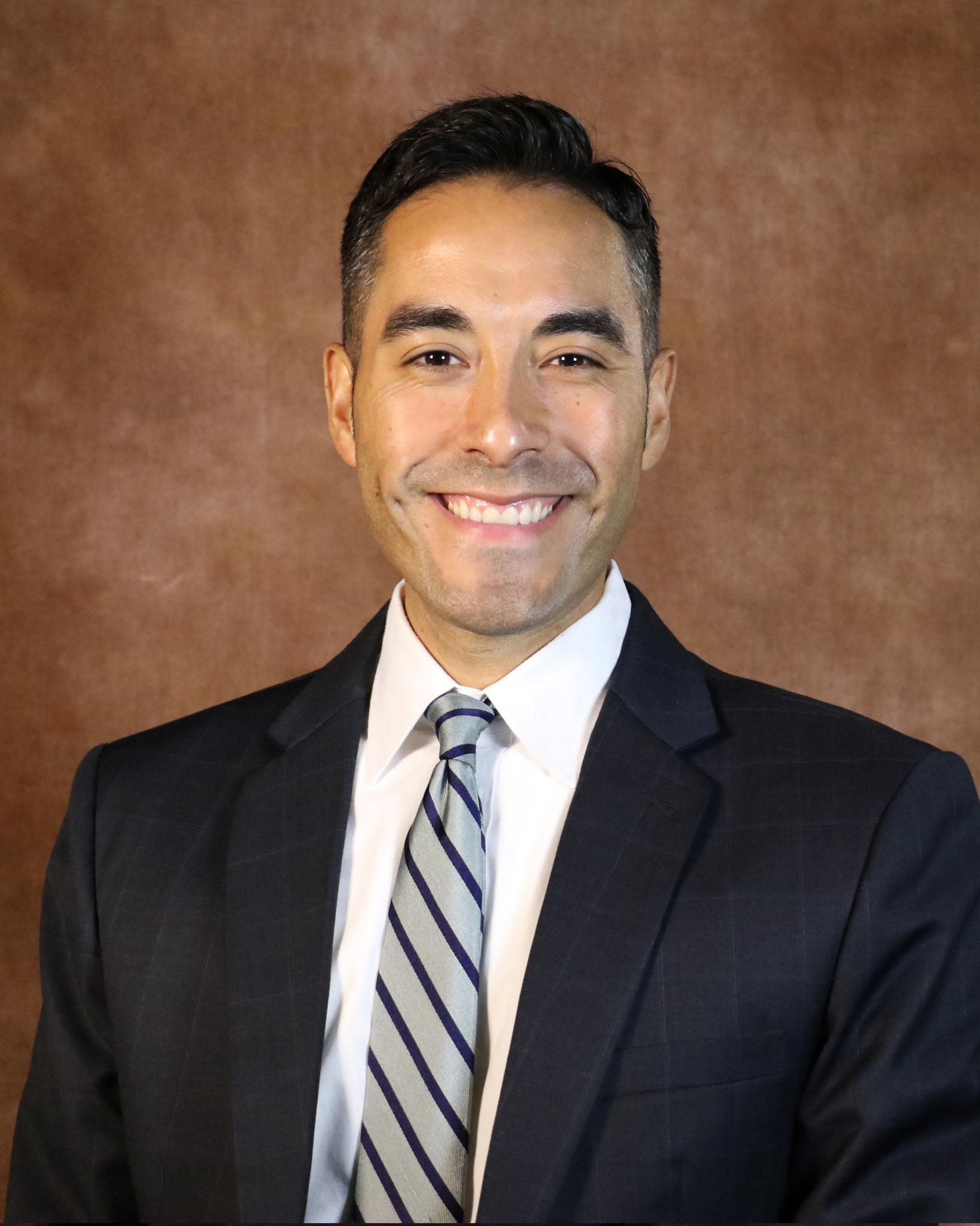 Headshot photo of Deputy County Manager Derrick Ramos