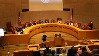A photo of the full CMGC chamber room during a BOCC meeting.